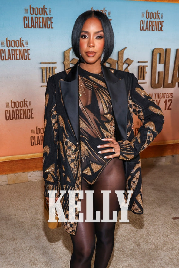 Radiant elegance Kelly Rowland stuns in our Princess white hoops at the Premiere of the -The Book of Clarence-