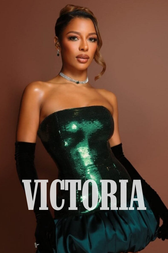 Victoria Monet in the Princess Collection wearing a limited-edition emerald choker designed by @k.salamoon.